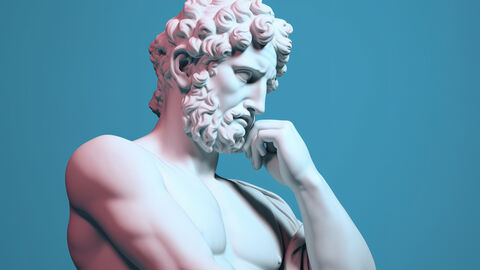 Eine griechische Statue legt die Hand ans Kinn.